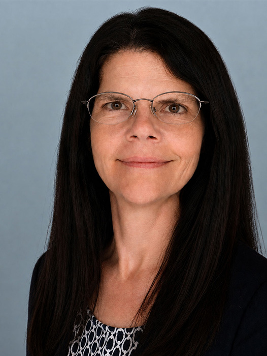 Karan Hustedt-Warren headshot