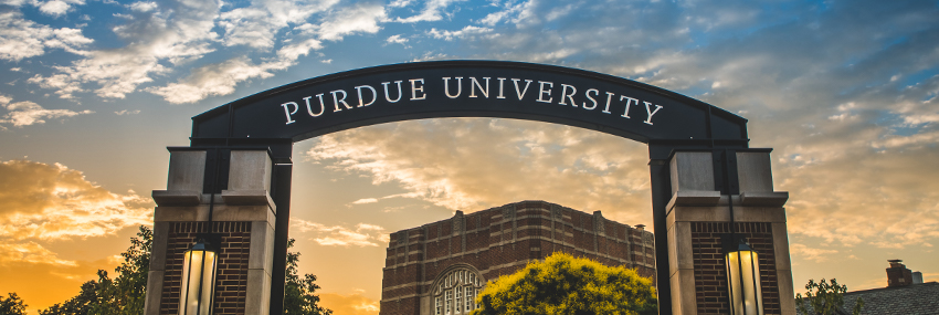 Photo of Purdue's arches while the sun sets.