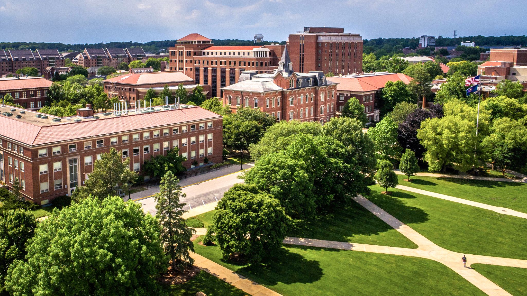 Drone shot of Purdue Memorial Mall showing all the buildings and lawn