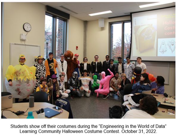 a group of students dressed in halloween costumes show off their attire during a costume contest