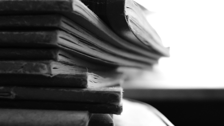 Closeup of stack of books.