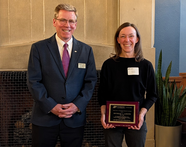 Department Head Frederick R. Davis with Professor Michelle LaBonte the recipient of the John C. Teaford faculty award