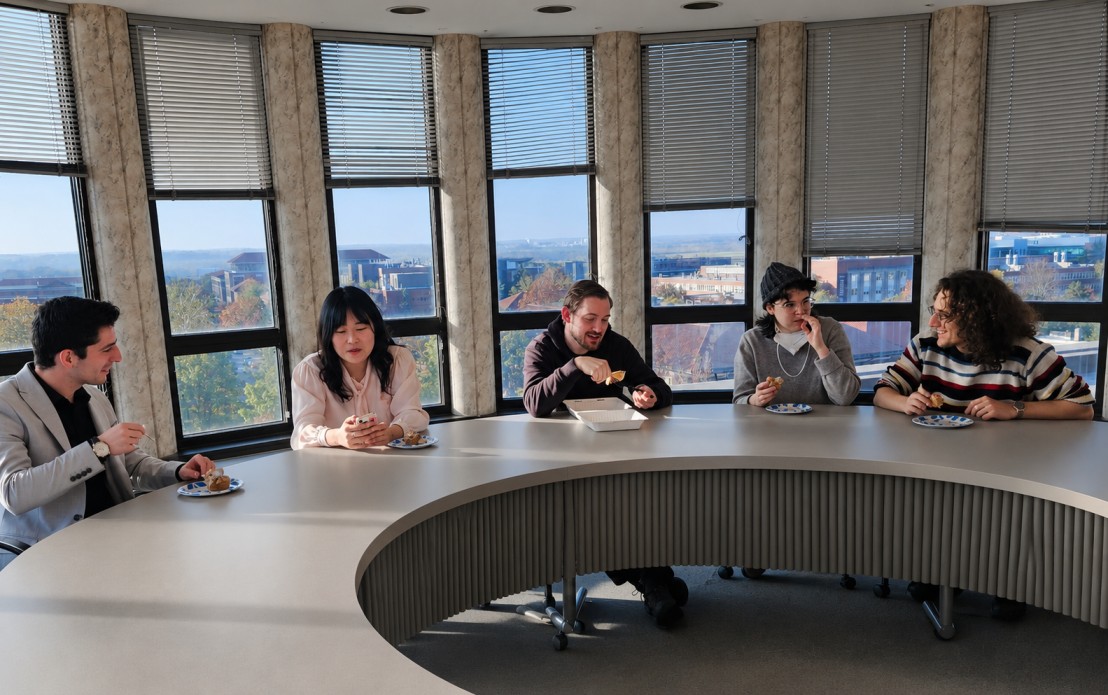 A group of grad students chatting