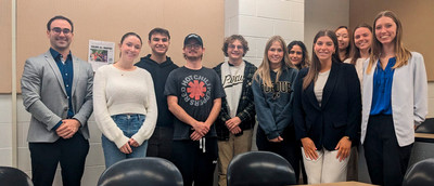 Professor Girard and undergraduate students