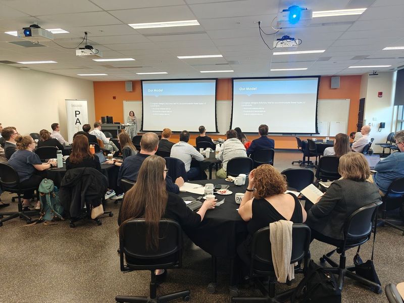 Professors collaborating on research.