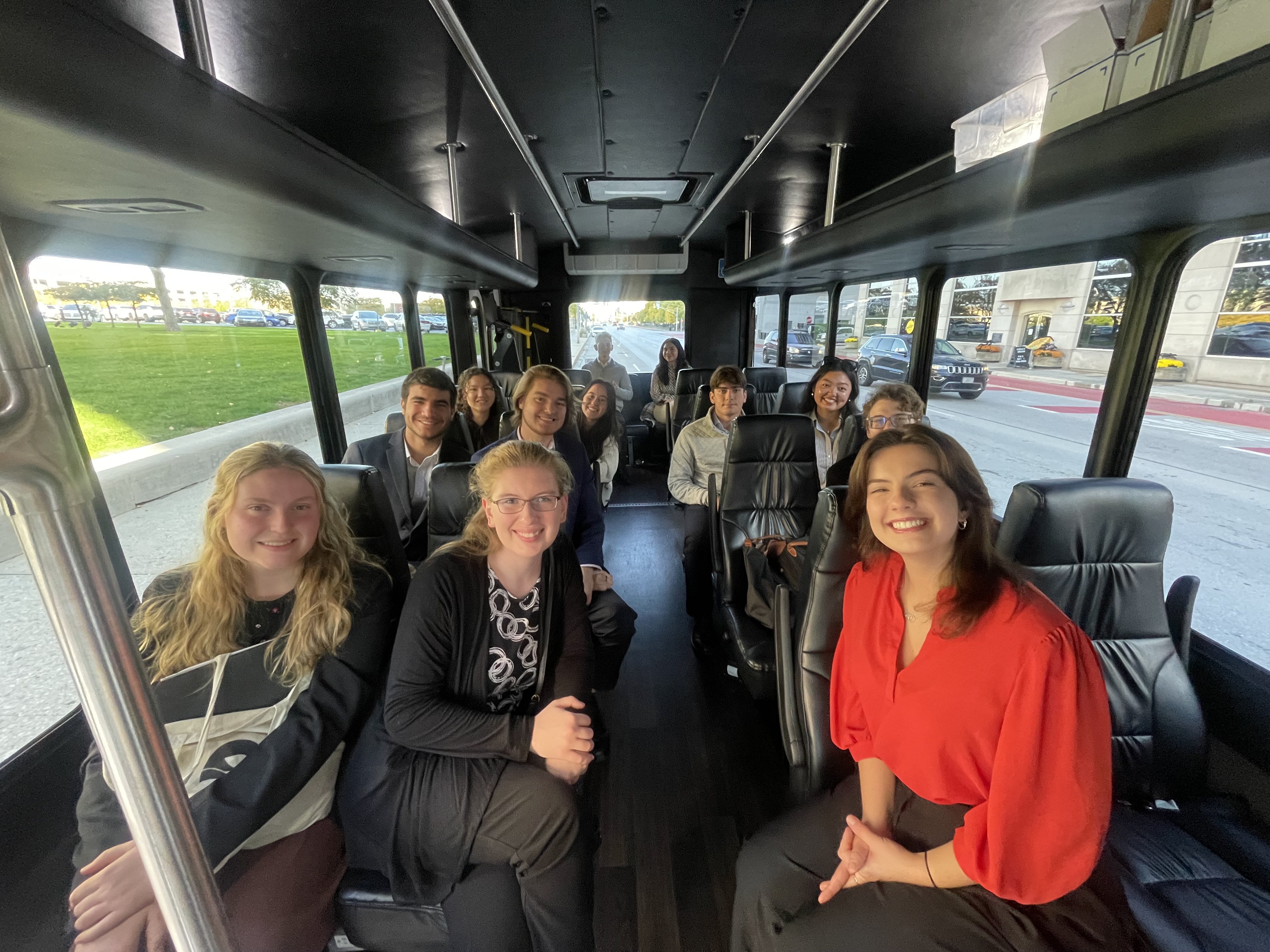 Students sitting on the chartered bus, heading to the Statehouse