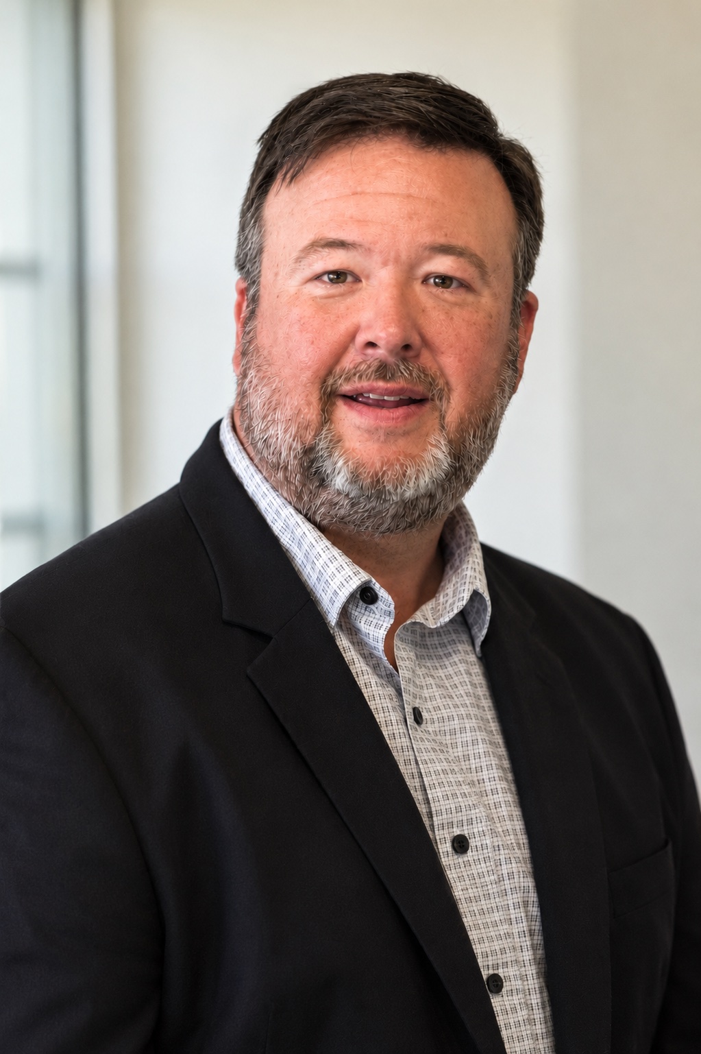 head shot of person looking at camera