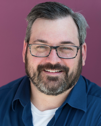 A headshot of Rich Dionne, Chair.