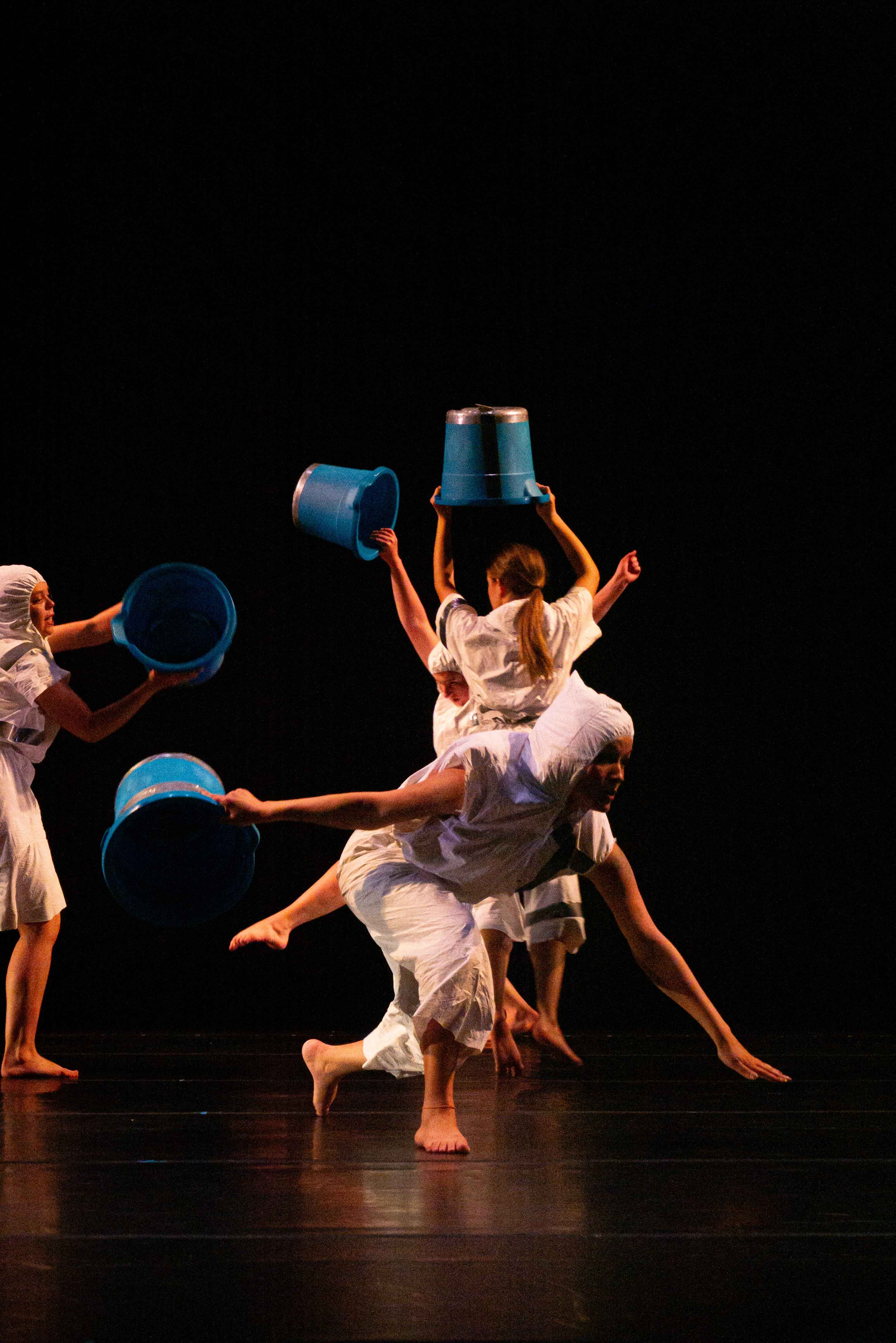 Purdue Contemporary Dance Company members on stage.