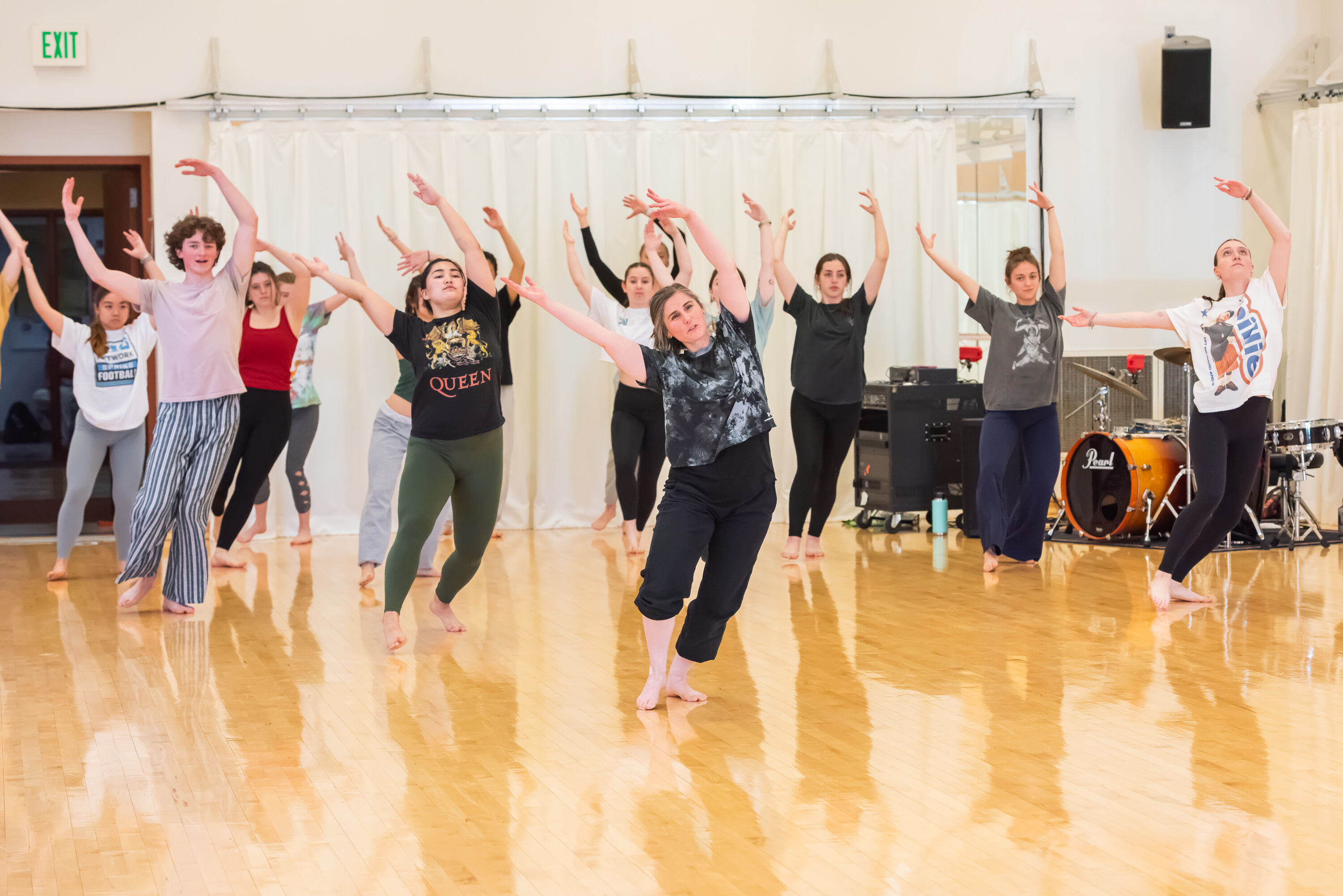 Students dancing with the instructor in the front.