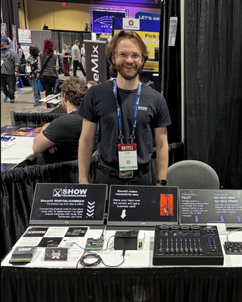 Trevor Marshal standing in front of a control board.