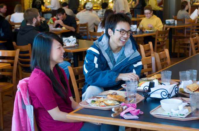 Students eating in a food court