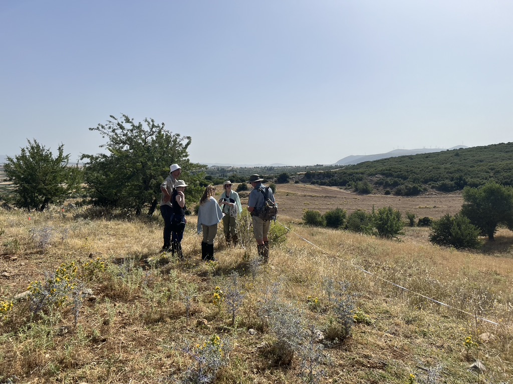 Purdue students learning new archaeological field techniques at Plataea.