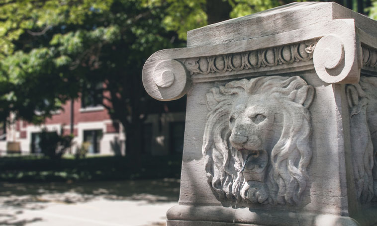 A fountain located on the Purdue campus depicting a lion.