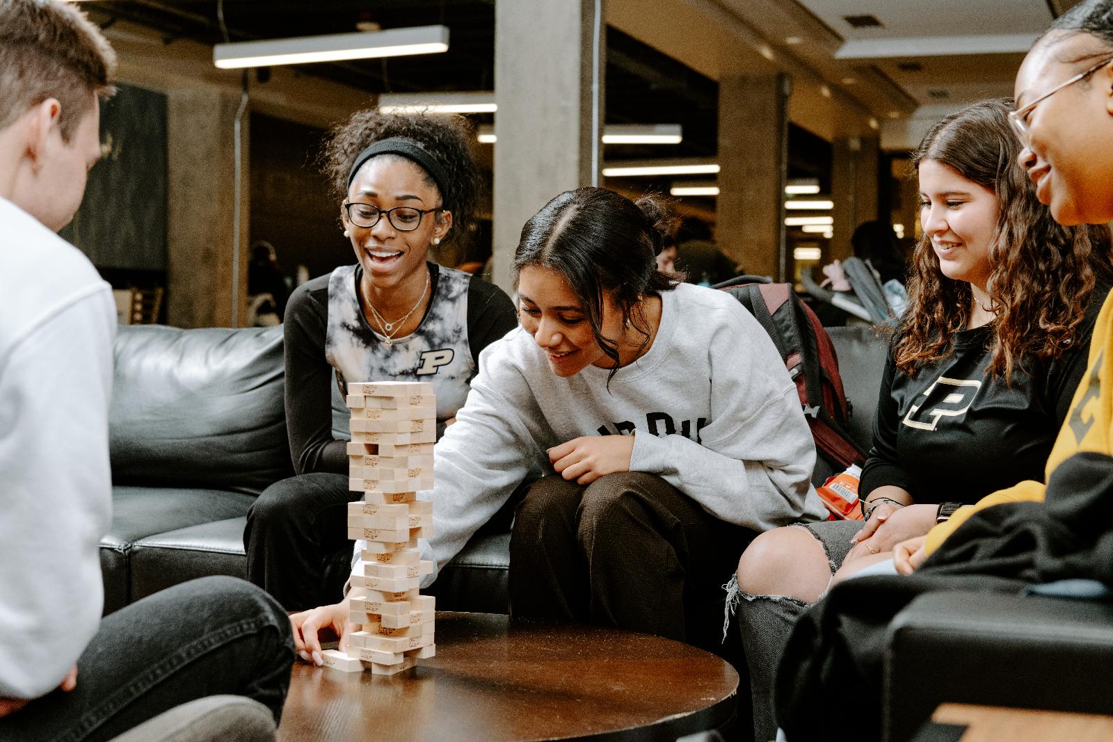 Students playing Jenga.