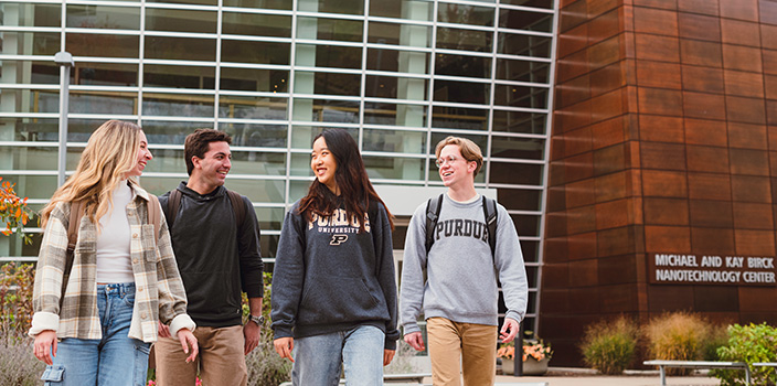 Students walking in front of the Purdue Nanotechnology building