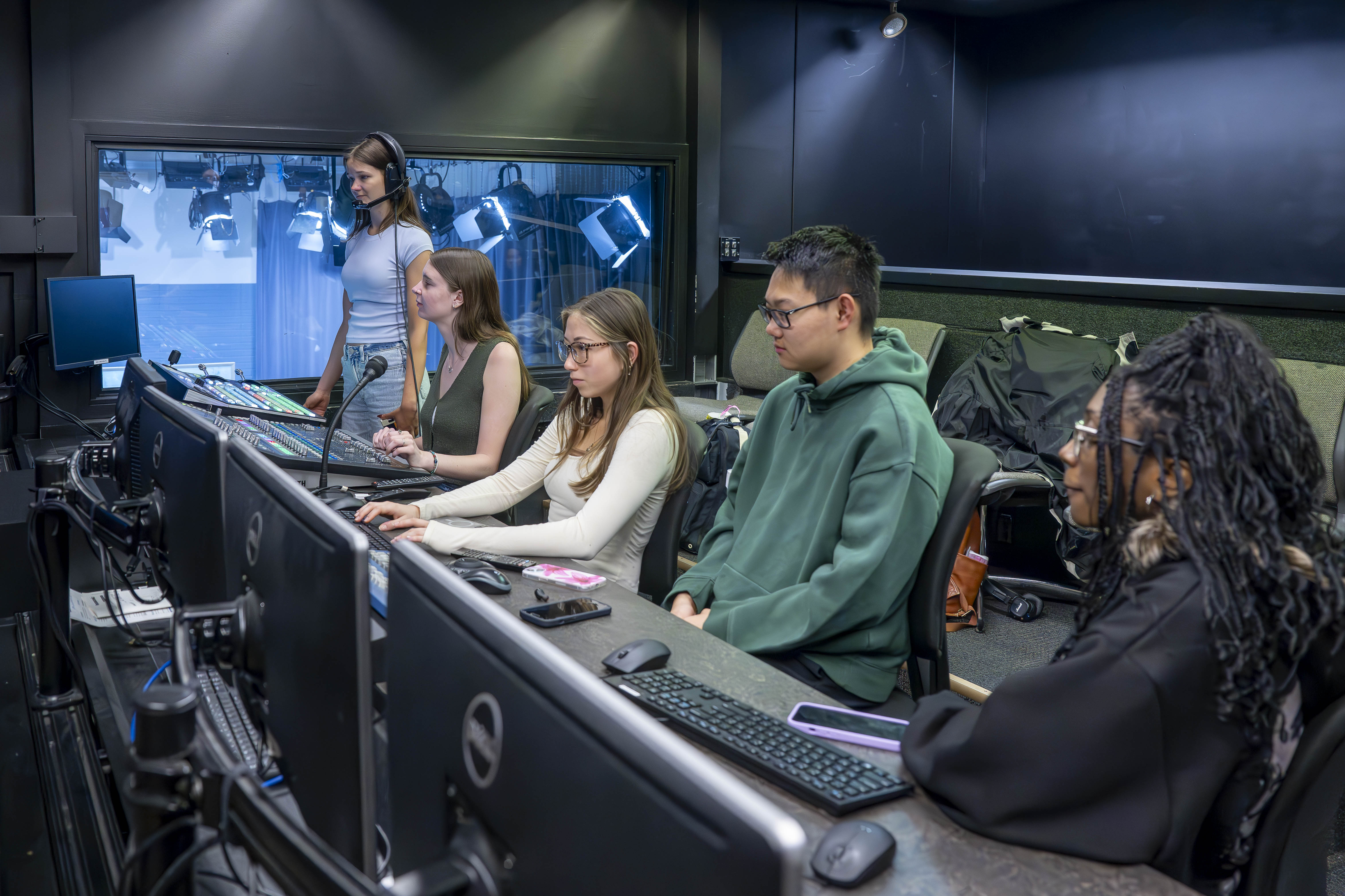 Students working in an audio-video studio.